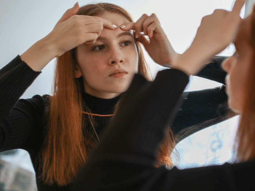 Teenage girl with acne